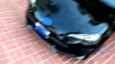 Наклонившаяся раком подруга дает себя драть возле спортивного автомобиля